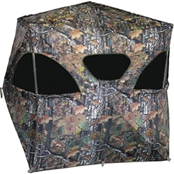 ALTAN SAFE THE DEN LTD BLIND (B-DN-506) Altan Safe The Den LTD Blind.
• Large blind with standing room and realistic 3-D leaves
• Windows on all sides and roof with option to zip closed
• Shoot thru mesh on all windows
• Size: hub to hub 70″ x 70″ x 65″ (H) (178x178x165 cm)
• Backpack carrying case:41″ x 7″ (104×18 cm)
• Frame: fiberglass poles
• Fabric: realistic camo design, no shine 150